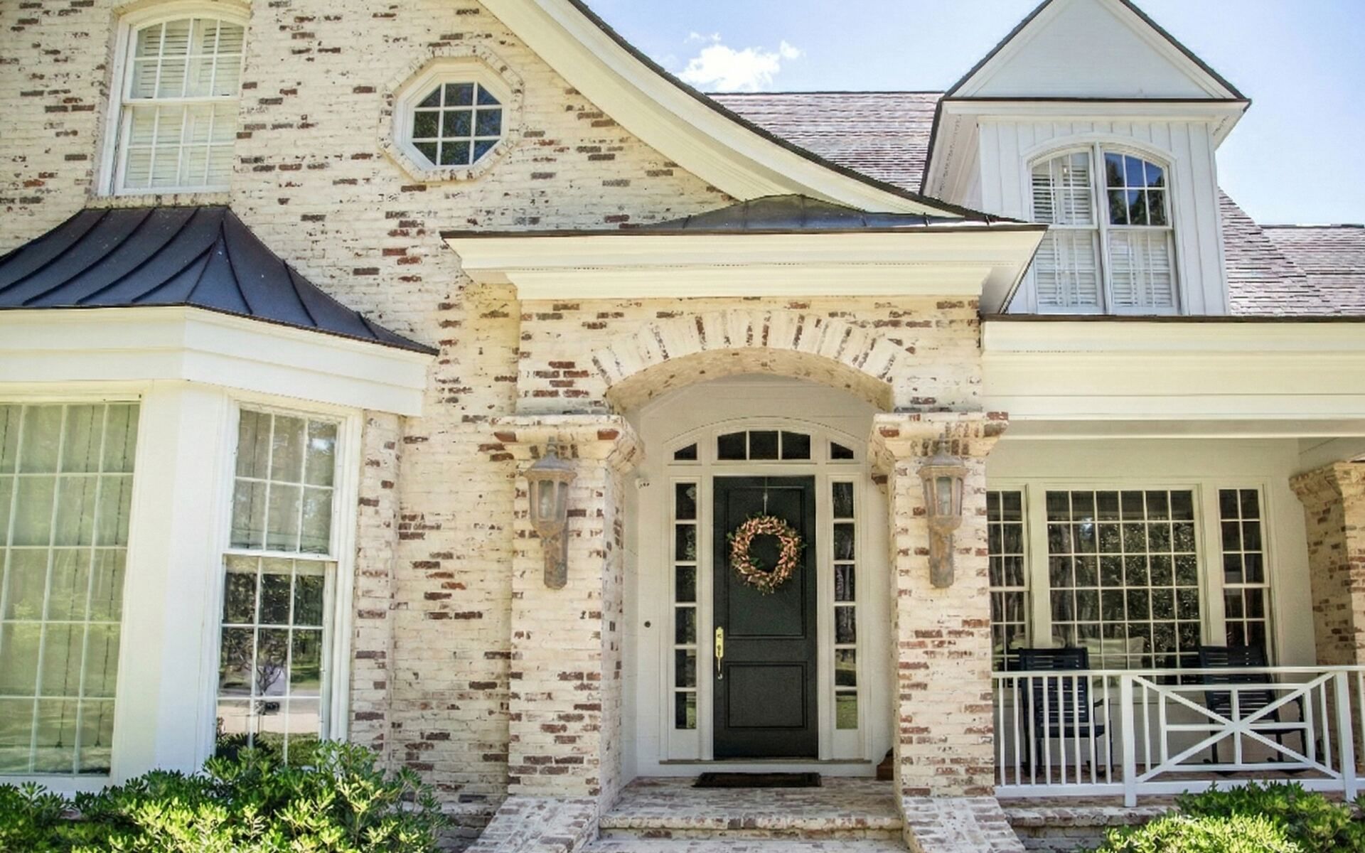 Limewash finish adding texture and depth to painted masonry